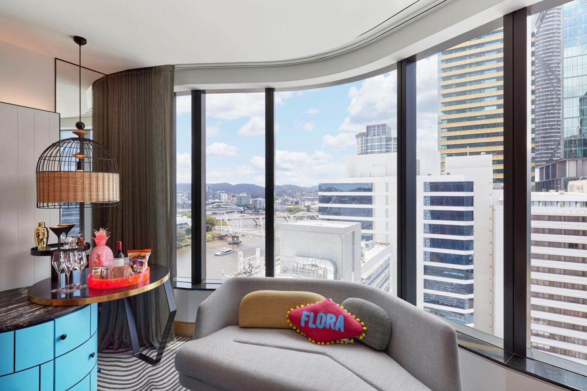 Hotel W Brisbane Extérieur photo A view of the living room in a typical apartment at Flora